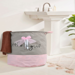 Little Girl Folding Laundry Basket